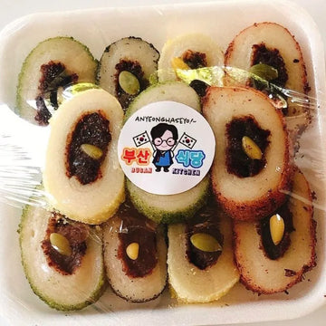 Angkotteok Traditional Korean Tteok in a container with a visible brand label.