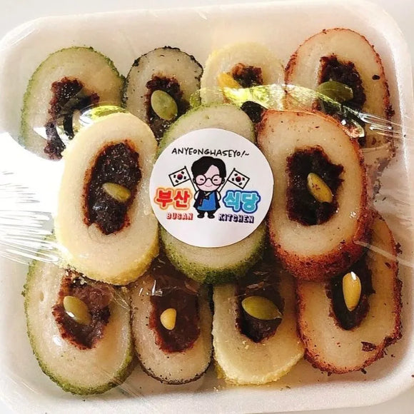 Angkotteok Traditional Korean Tteok in a container with a visible brand label.
