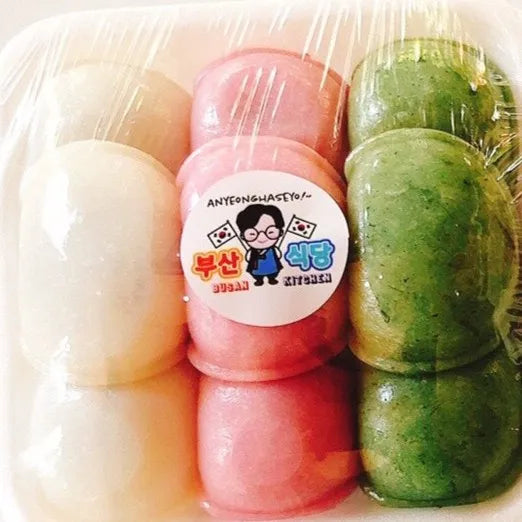 Packaged halfmoon rice cake with a visible brand label on a white background