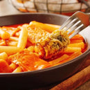 Tteokbokki with gimmari in a bowl