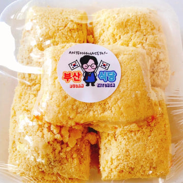 Packaged rice cake filled with pumpkin with a visible brand label on a white background