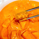 Rose Tteokbokki with chopsticks