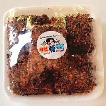 Packaged rice cakes topped with red beans with a visible brand label on a white background